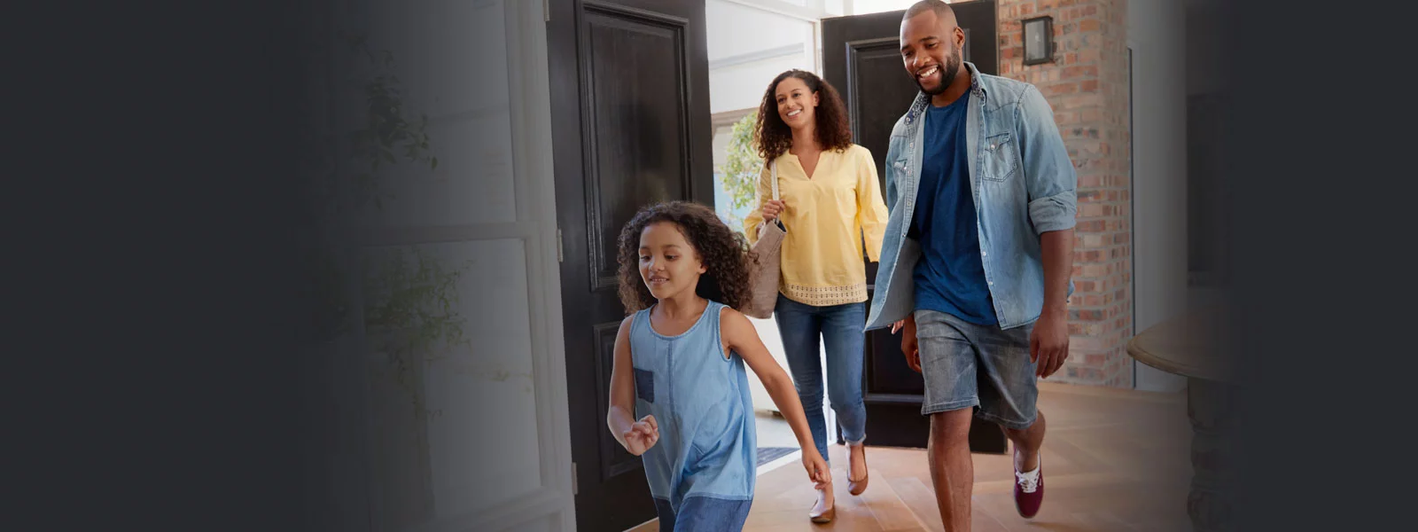 Family walking into pest free home